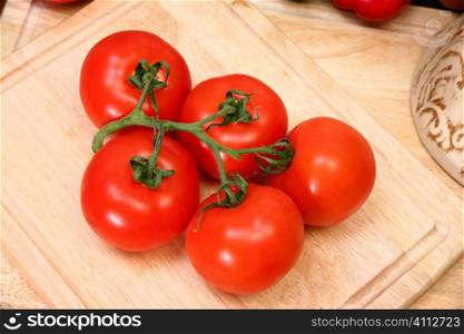 Vine Ripe Tomatoes on Cutting Board