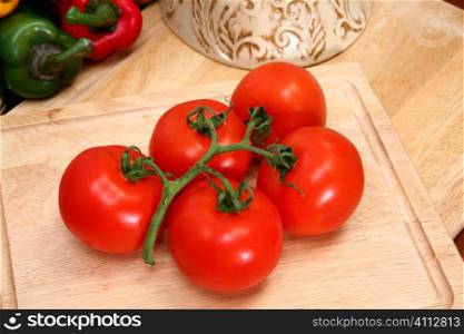 Vine Ripe Tomatoes on Cutting Board