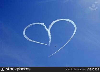 Vintage Aircraft Sky Writing Romantic Heart Shape. Vintage Aircraft Sky Writing Romantic Heart Shape.