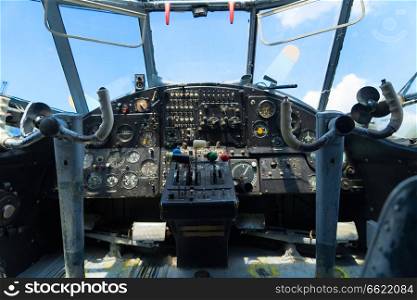 Vintage airplane dashboard, shallow focus on leverers. Vintage airplane dashboard