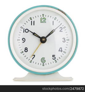 Vintage alarm clock analog in green metal round case isolated on white
