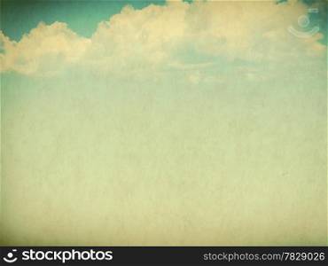 Vintage background in the blue shade with clouds