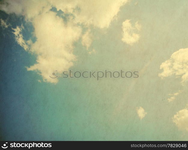 Vintage background in the blue shade with clouds