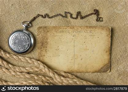 Vintage background with old paper and pocket watch