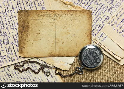 Vintage background with old postcard and letters