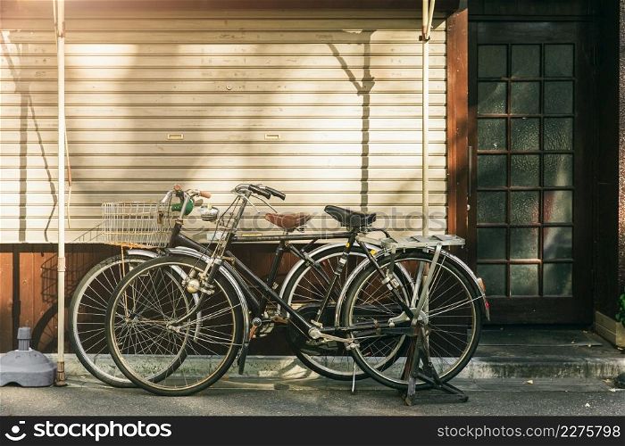 vintage bicycle parking at the street in Japan