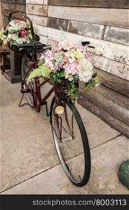 Vintage bicycle with flower basket