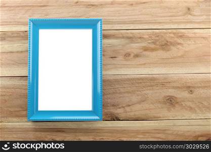 Vintage blue Photo frame on wooden background.. Vintage blue Photo frame on wooden background and you can input picture or data and text to empty space.