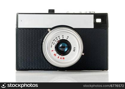 vintage camera isolated on white. Focused on lens.