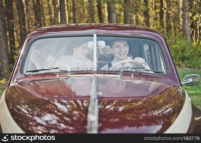 Vintage car with passengers.. The couple in the cabin of the old car 4170.