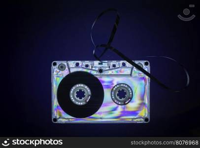 Vintage cassette tape on dark blue background