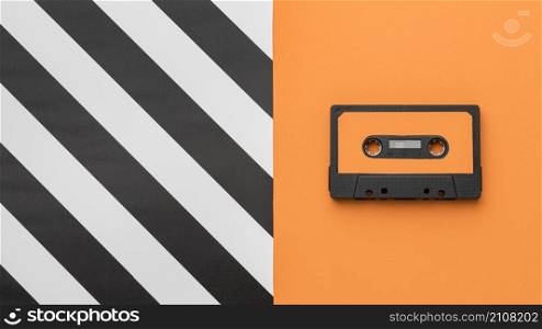 vintage cassette tape orange striped background