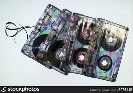 Vintage cassette tapes on light blue background