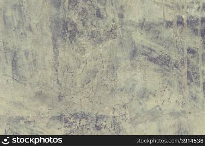 Vintage cement wall as background.Film style color effect