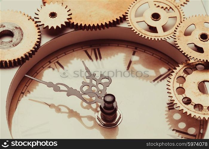 Vintage clock and details of the mechanism close-up. The vintage clock