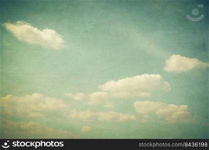 Vintage clouds and blue sky with texture effect.