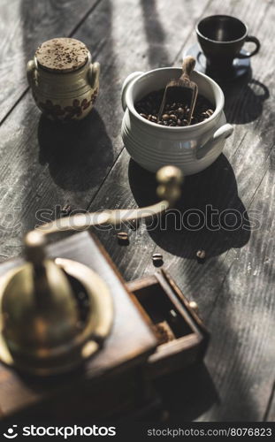 Vintage coffee grinder and beans