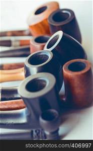 vintage collection of tobacco pipes