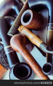 vintage collection of tobacco pipes