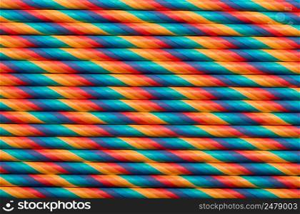Vintage colored paper straws abstract background