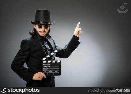 Vintage concept with man wearing black top hat