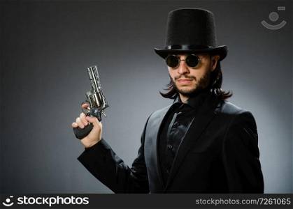 Vintage concept with man wearing black top hat. The vintage concept with man wearing black top hat