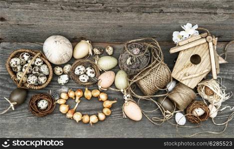 vintage decoration with eggs and flower bulbs. nostalgic easter still life home interior. wooden background