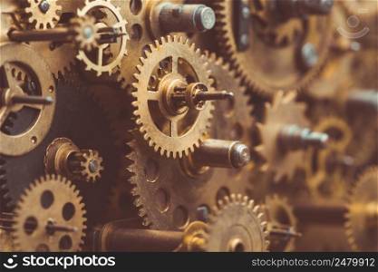 Vintage gears and cogs in mechanism macro