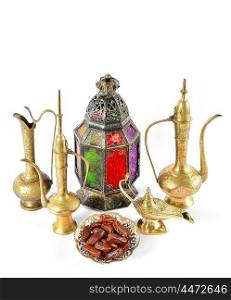 Vintage golden arabic decorations. Holidays composition with dates fruits. Oriental hospitality concept