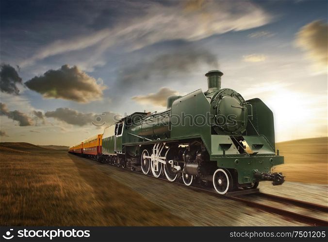 vintage green and yellow steam powered railway train moving