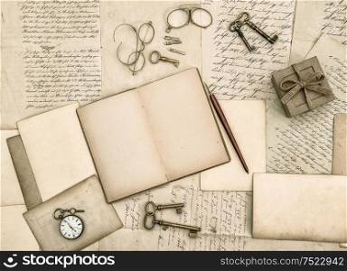 Vintage handwriting and antique office tools. Nostalgic paper background