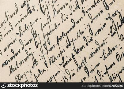 vintage handwriting with a text in undefined language. manuscript. parchment. grunge paper background