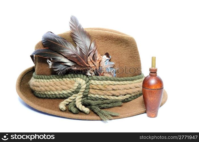 vintage hunting hat and wooden game call for foxes and hazel grouse