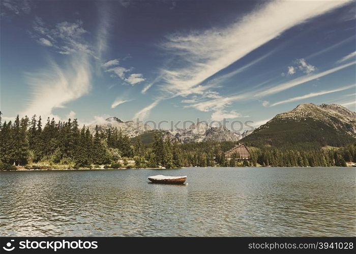 Vintage image of alpine mountain lake