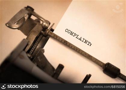 Vintage inscription made by old typewriter, Complaint
