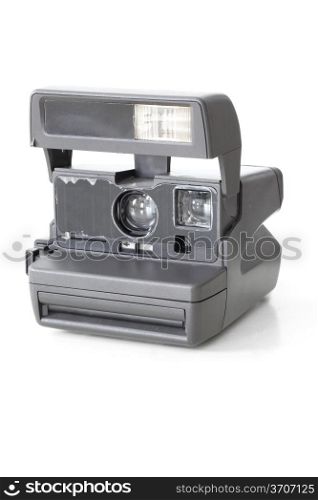 Vintage instant photo camera on white background