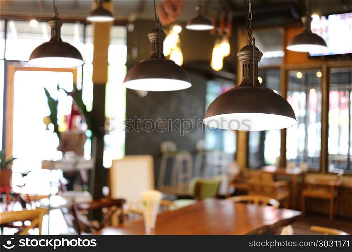 Vintage lamps in a restaurant.. Vintage lamps in a restaurant,concept of interior with lights.
