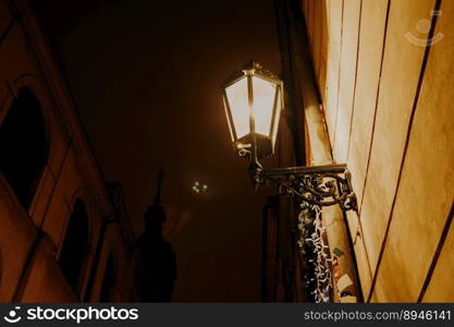 Vintage lantern at night street. Prague city. Copy space. Retro style. High quality photo. Vintage lantern at night street. Prague city. Copy space. Retro style.