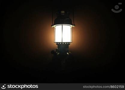 vintage lantern l&isolated on black background
