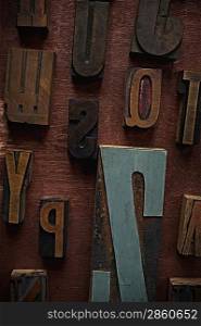 Vintage letters on wooden background