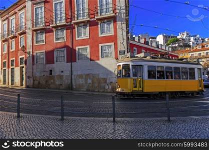Vintage Lisbon tram on city street, sunny day, Portugal&#xA;