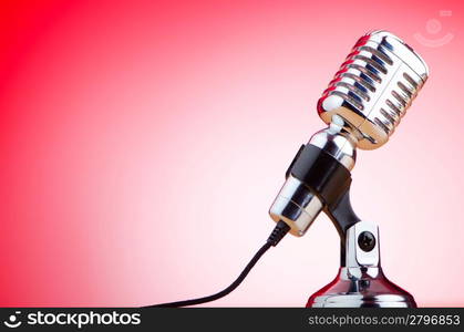 Vintage microphone against the background