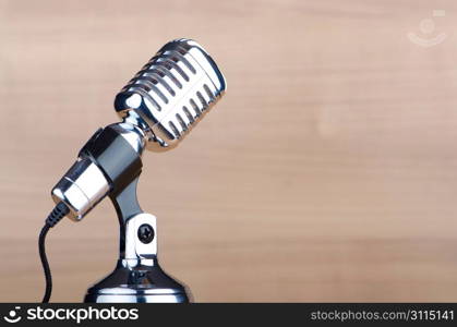 Vintage microphone against the background