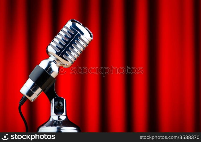 Vintage microphone against the background