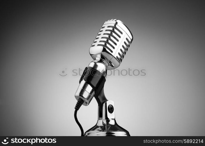 Vintage microphone against the background