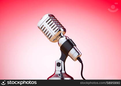 Vintage microphone against the background