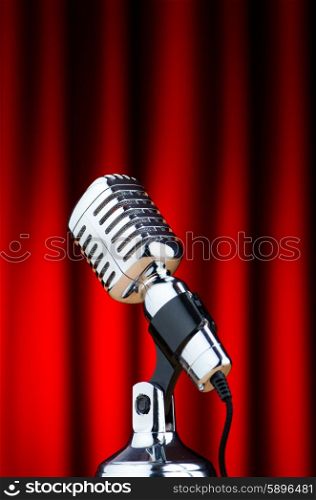 Vintage microphone against the background