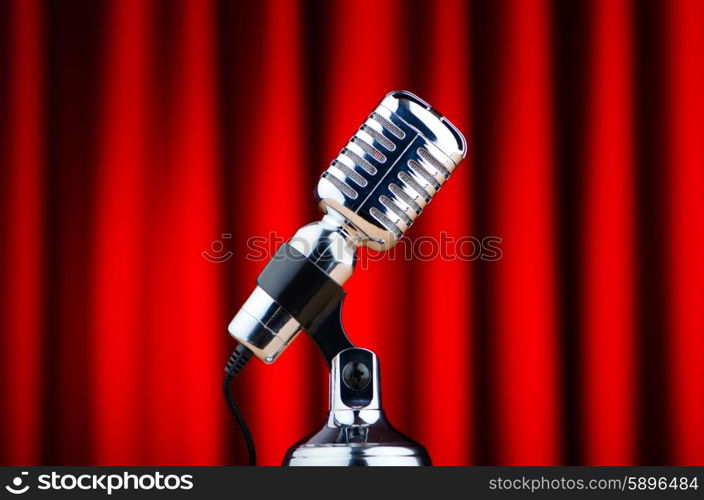 Vintage microphone against the background