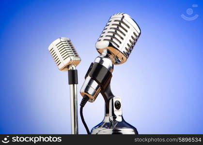 Vintage microphone against the background