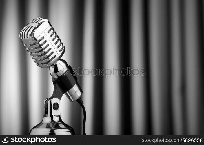 Vintage microphone against the background